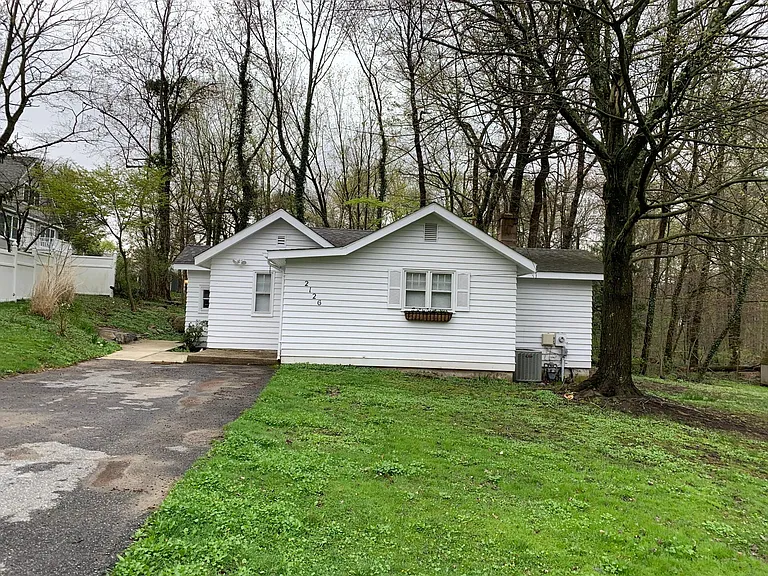 Quiet, wooded setting with private driveway.