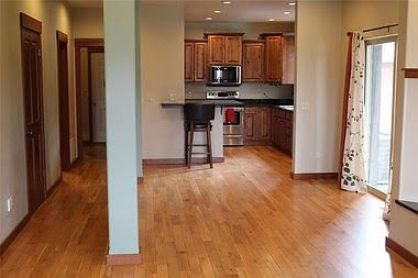 Open concept main floor; view of dining room into kitchen