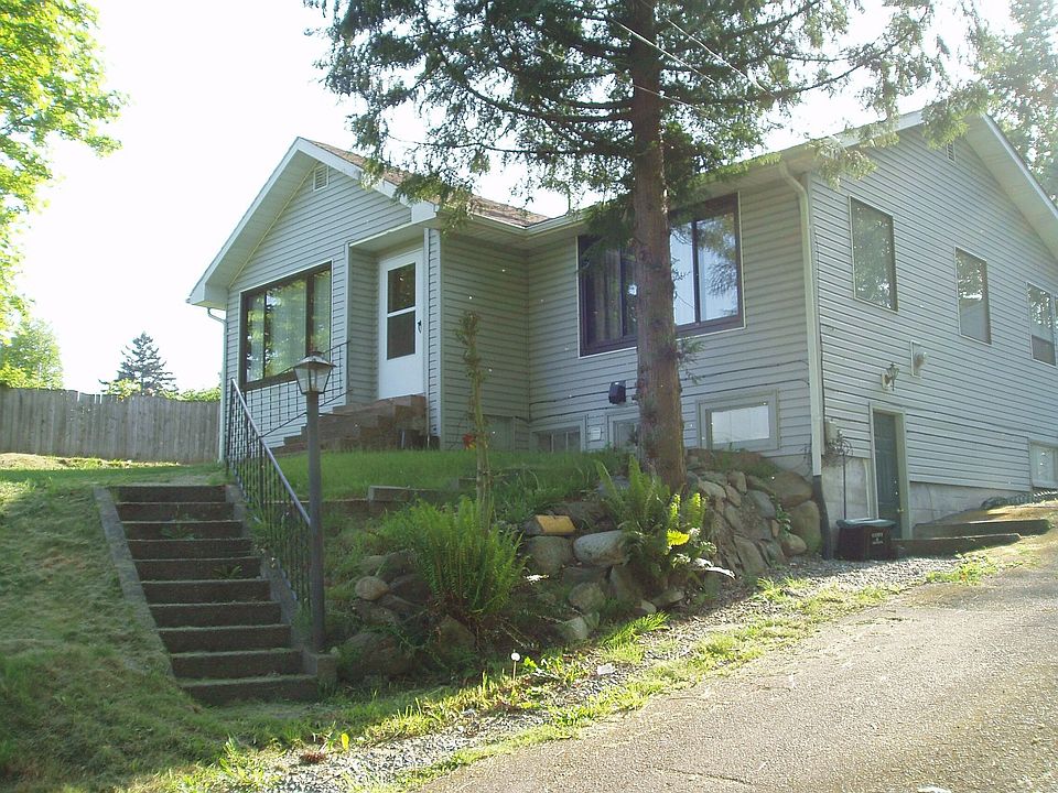 Front Entry, Side Entry to Basement.  Long Private Driveway to Detached Garage