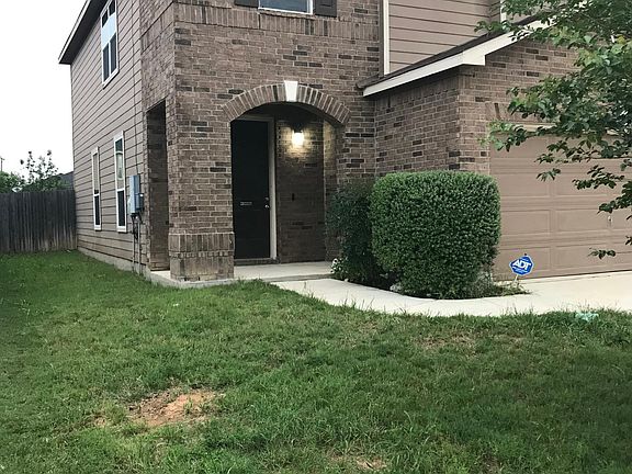 Front entrance, backyard photo coming, needs grass cut. Large backyard with covered patio.