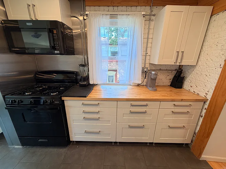 Gas stove/oven and microwave. Keurig coffee maker