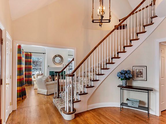 First impressions mean everything!  The stunning two-story foyer of this gracious home, with its won