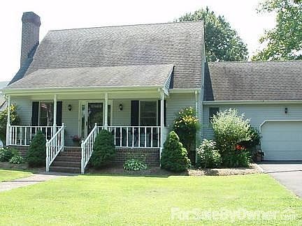This is the main house with an attached one car garage.