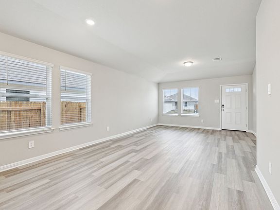 Enjoy quality time with family and friends in the living and dining areas.