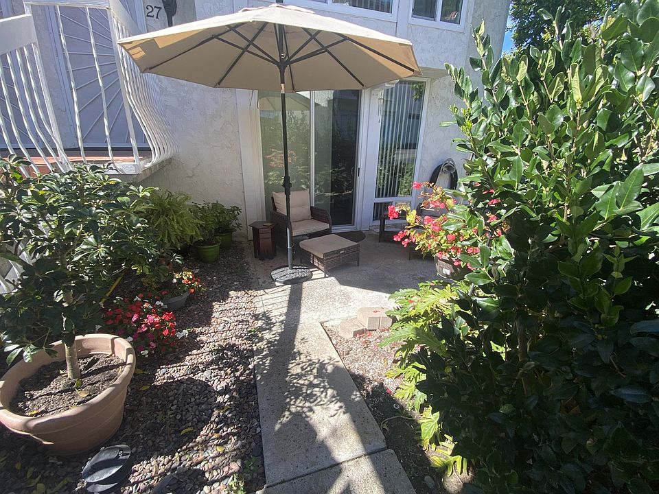 Walking through the patio into your private entrance.