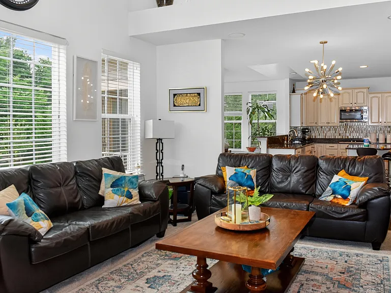 Livingroom _ Shown furnished. If a furnished rental arrangement is agreed upon, the room would be presented as shown.