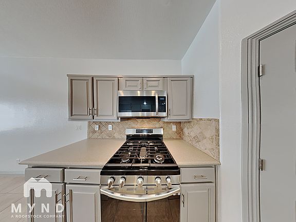 4th image of 8675 Traveling Breeze Ave Unit 103
