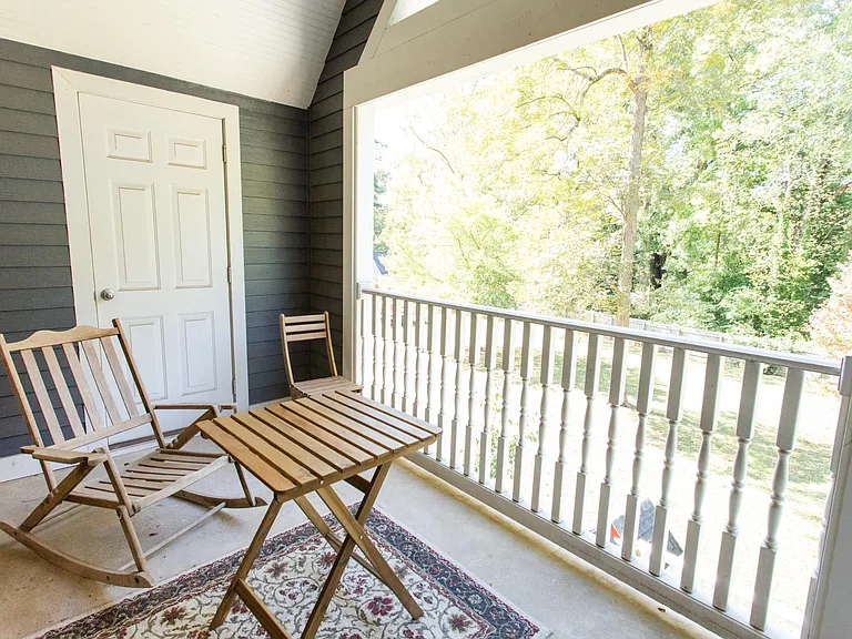 Balcony over back yard. Accessible from common area.
