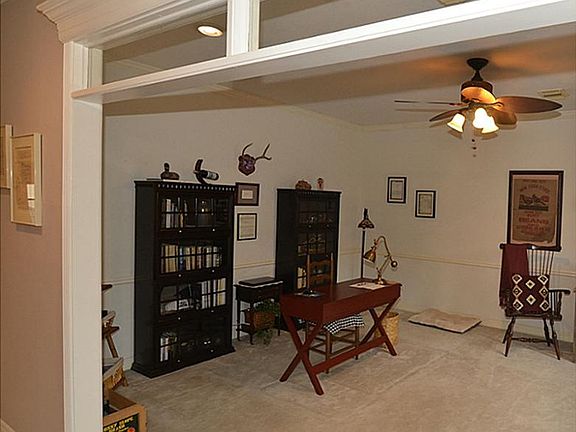 Custom Trim work with Transom open to Large Study or Formal Living