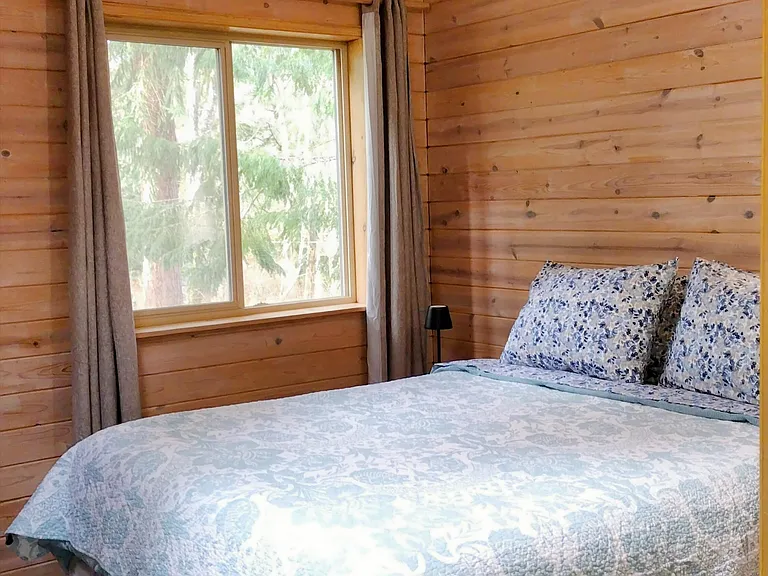 Second bedroom has sky light and vaulted ceilings.