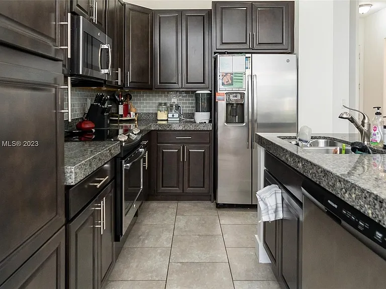 9794 W 34th Ct — Photo 27