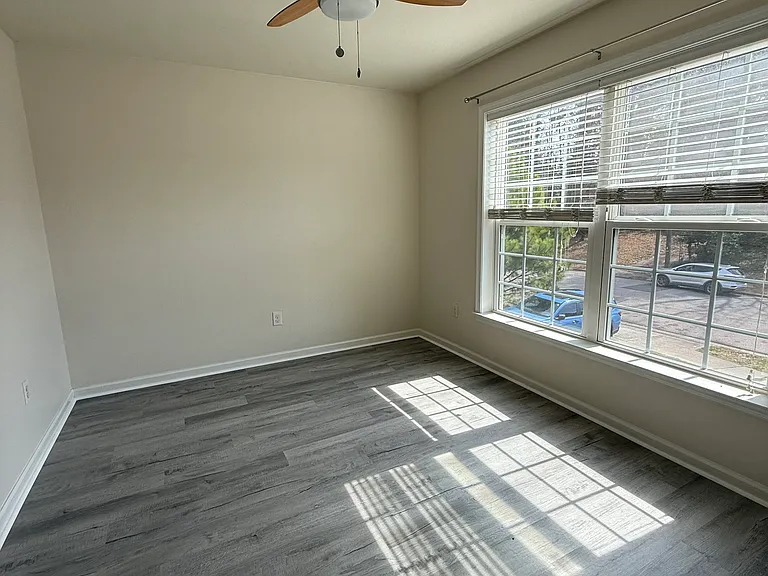 Upstairs primary bedroom, faces front yard. (1st of 3)
