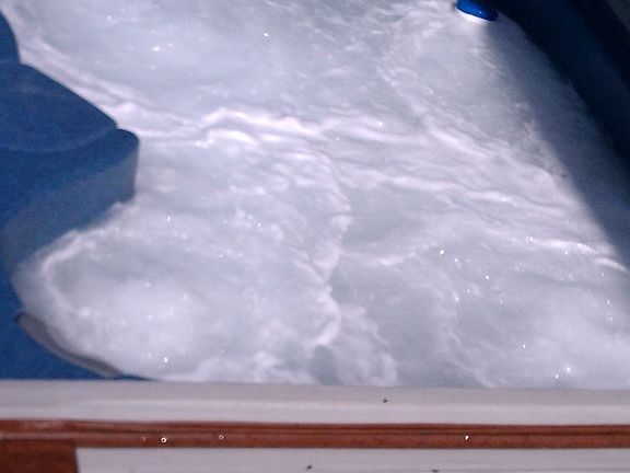 Caldera hot tub on main floor deck