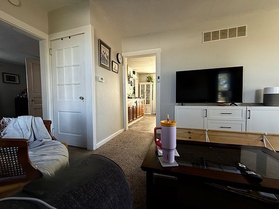 Living room with kitchen entry view
