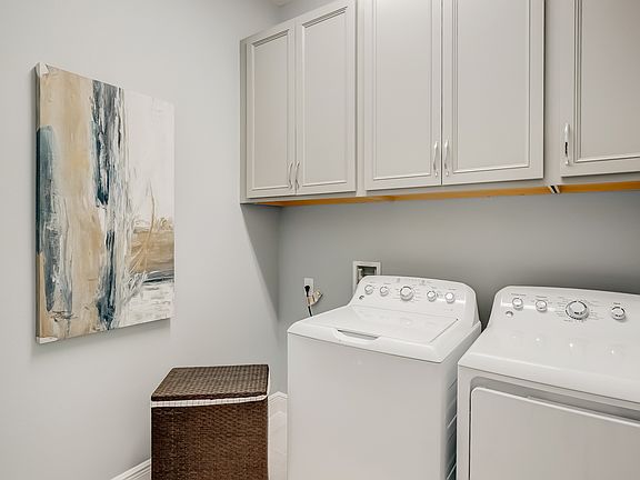 Laundry room with cabinet space