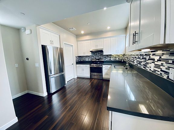 Kitchen with stainless-steel appliances