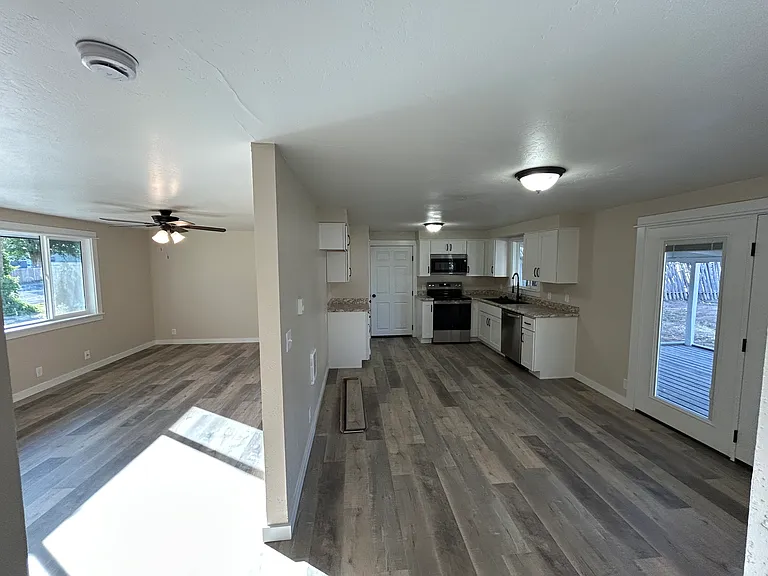 Living room on the left, kitchen on the right