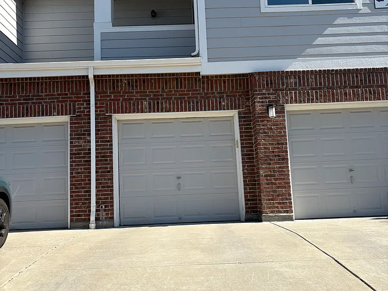 Attached garage the walks directly into unit (middle garage)
