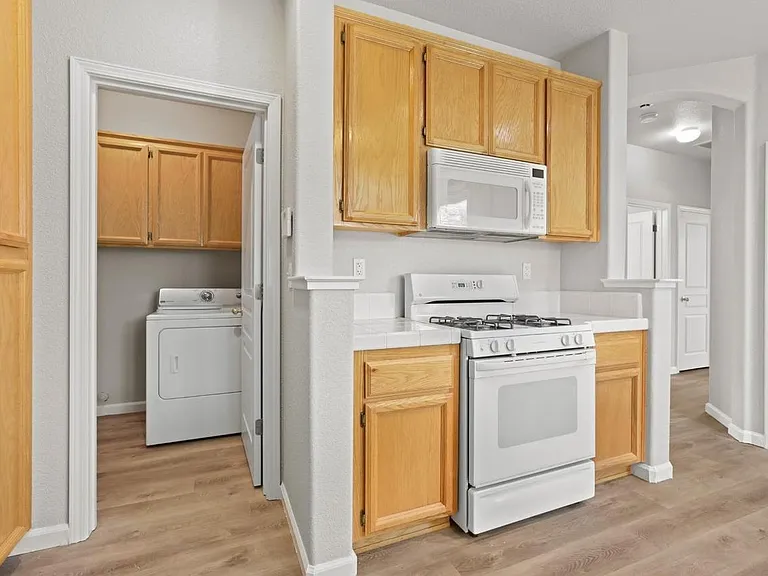 Laundry room next to the Kitchen.