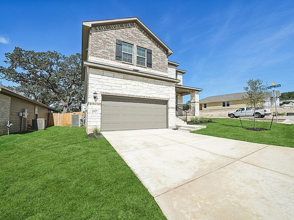 Front exterior of the Medina floorplan at a Meritage Homes community.