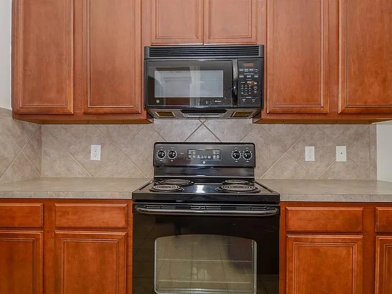 Kitchen Area with Stovetop (now replaced with Gas Oven)