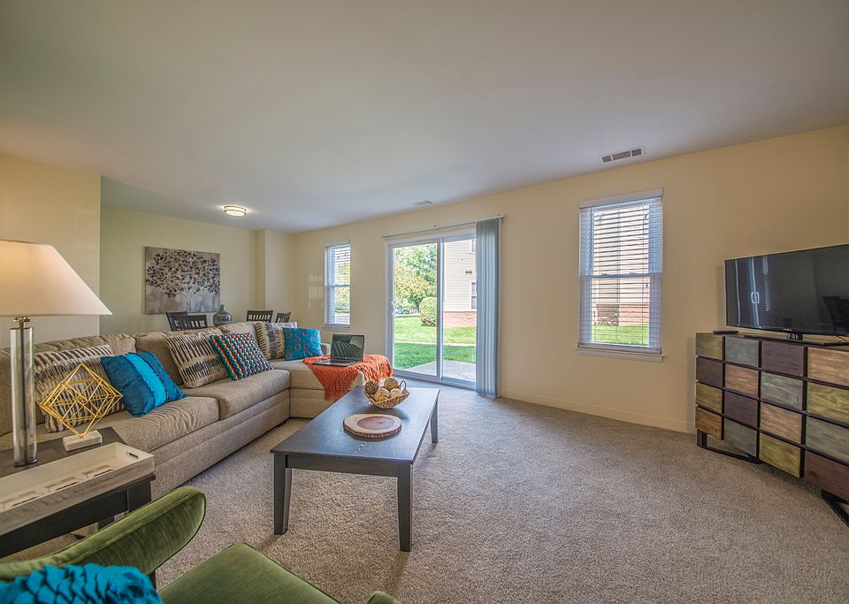 Huge living rooms with walk-out patio in all townhouses and select apartments