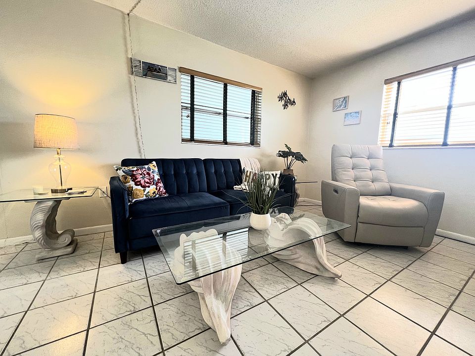 Living Room with Sofa and Recliner