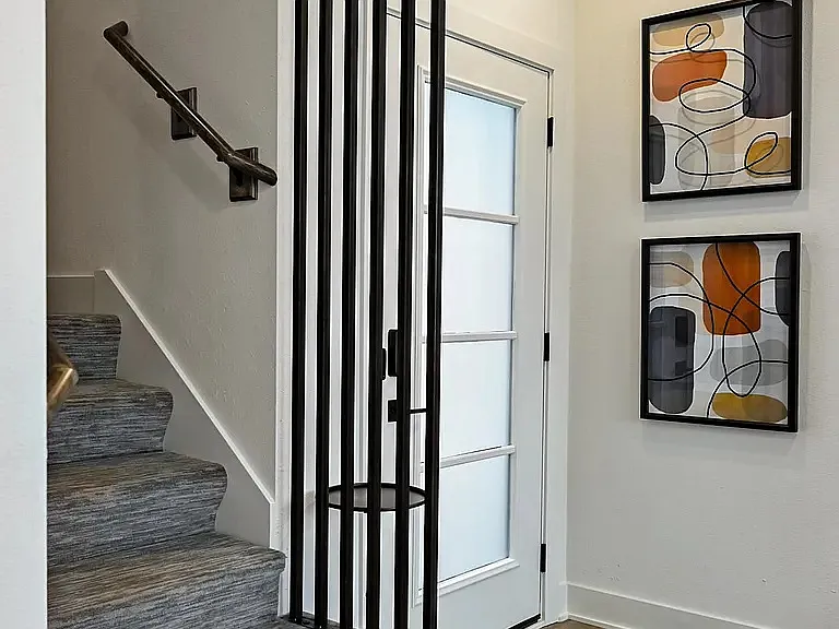 Bright modern foyer with luxury flooring, soaring ceilings, and stylish contemporary staircase design.

Photos are representative and finishes or layouts may vary slightly by unit.