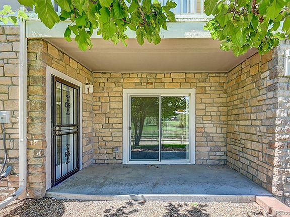 Covered patio off of living area and main bedroom.