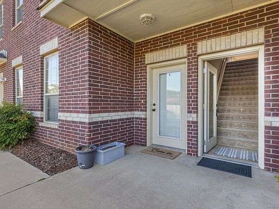Private front door leads to stairs for the upstairs apartment. Everything is on the second floor.