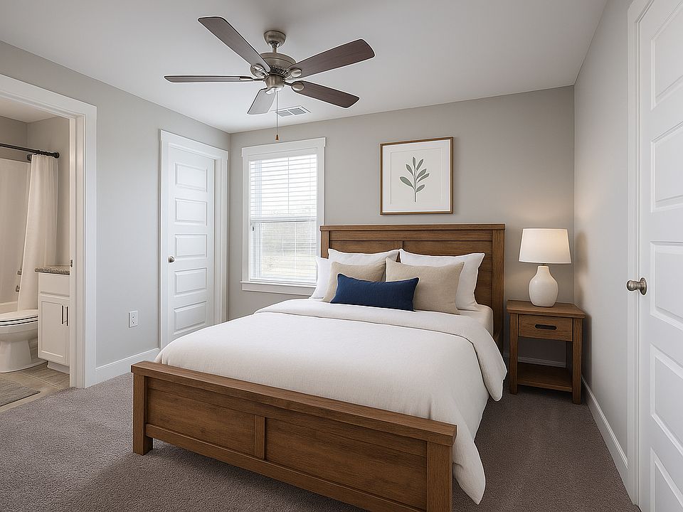 This cozy bedroom is set up perfectly to make you feel right at home.