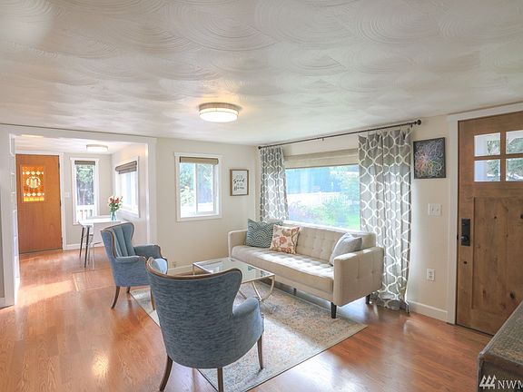 Living Room with Large Picture Windows, Territorial Views.