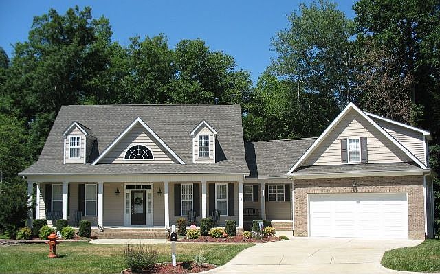 FRONT WITH ROCKING CHAIR FRONT PORCH