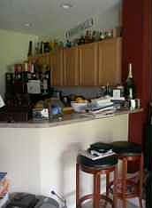 Kitchen with bar countertop