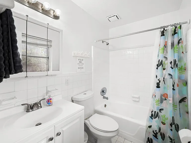 Private Bathroom - Large master bedroom with 40' TV, large closet, desk & chair, dresser, mirror and night stand