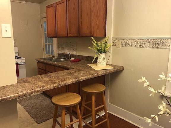 Snack bar in addition to dining area. Door leads to laundry room