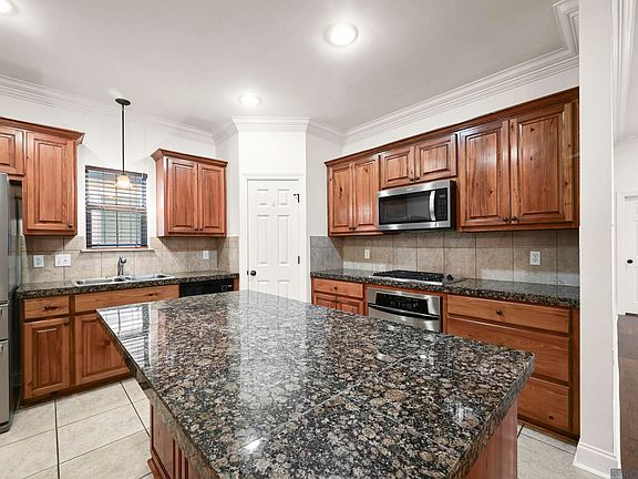 5th image of 9216 Magnolia Leaf Ave