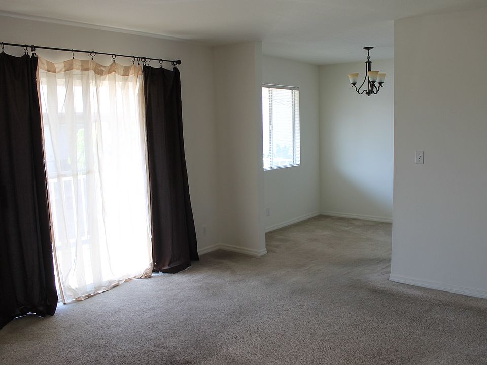 Living Room with large slider to balcony.