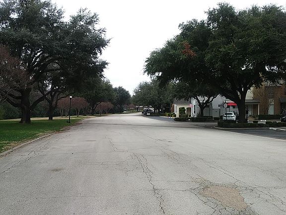 Driveway leading into complex