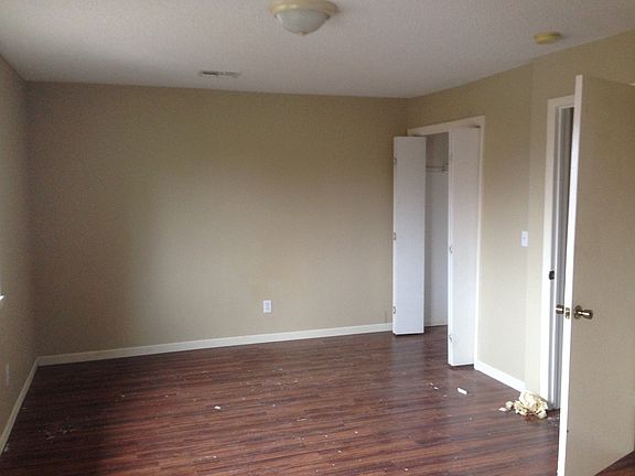 Large living area with beautiful new flooring