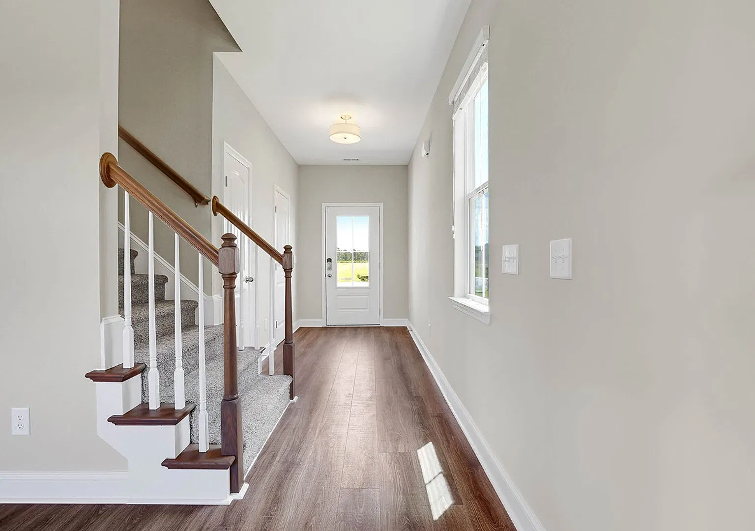 Beautiful home with a charming wrap-around front porch and open floor plan! — Photo 2