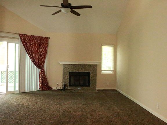 Family room with sliding glass doors to the balcony.