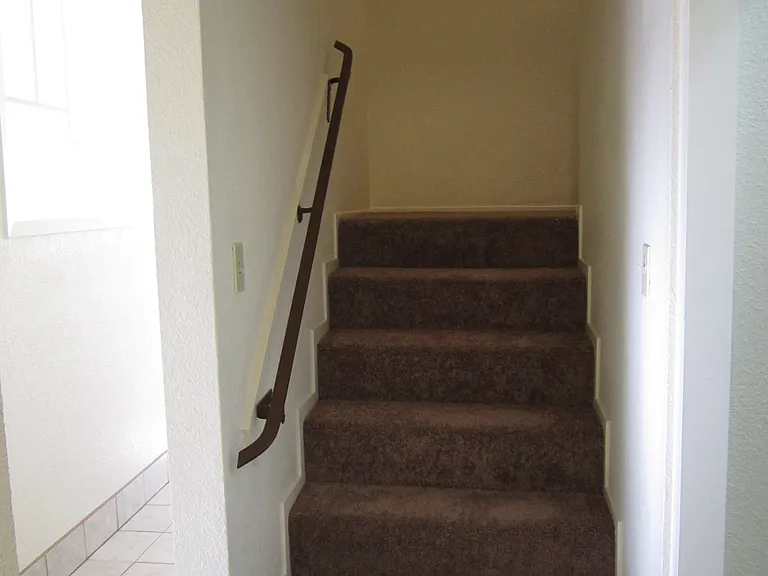 EZ comfortable stairway walk with secure handrail; walk up short area, platform area, walk up short area to upstairs living area
