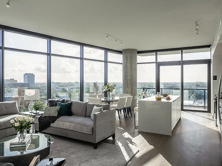 Spacious Living Room and Kitchen with Corner Windows