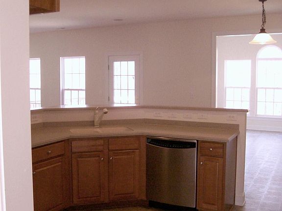 Kitchen looking out to Sunroom