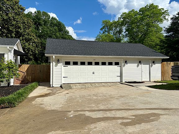 Oversized 2 car garage with 10x24 storage room and separate entry door
