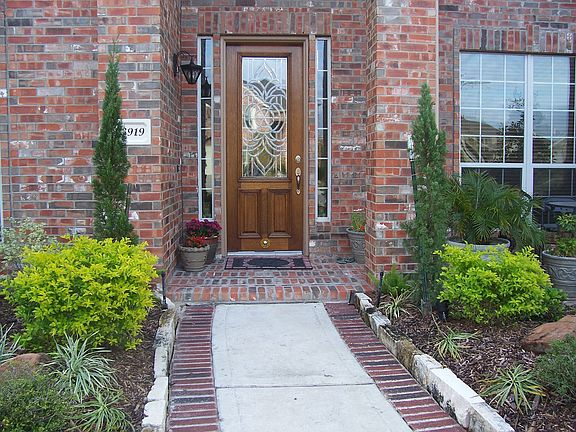 Great entry with lush landscaping