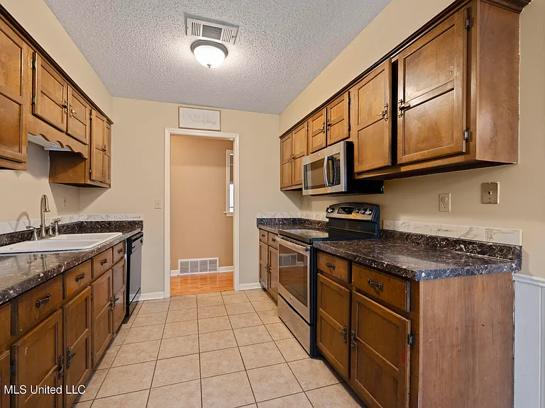 7188 Skidmore Cv — Photo 12