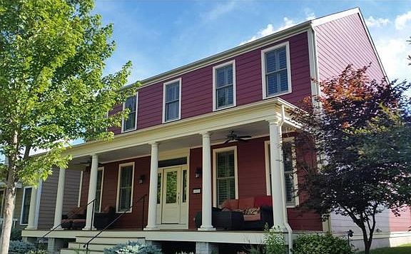Gracious, large front porch invites you to come sit a while! Welcome Home!