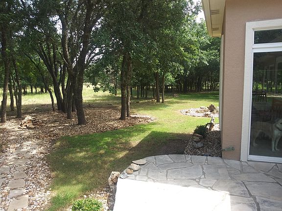 Back porch facing sliding door to dining room